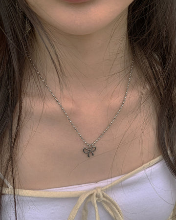Kahi Ribbon Ball Necklace